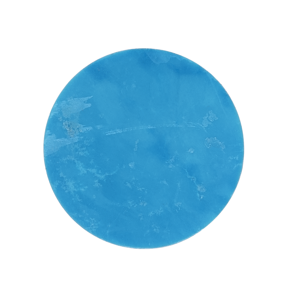 Un plaque de pierre naturelle turquoise ronde diamètre 15 mm